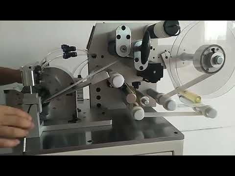 OEM Logo Fold Mask Labeling Machine for Tube, Round Bottle Sticker Labeler