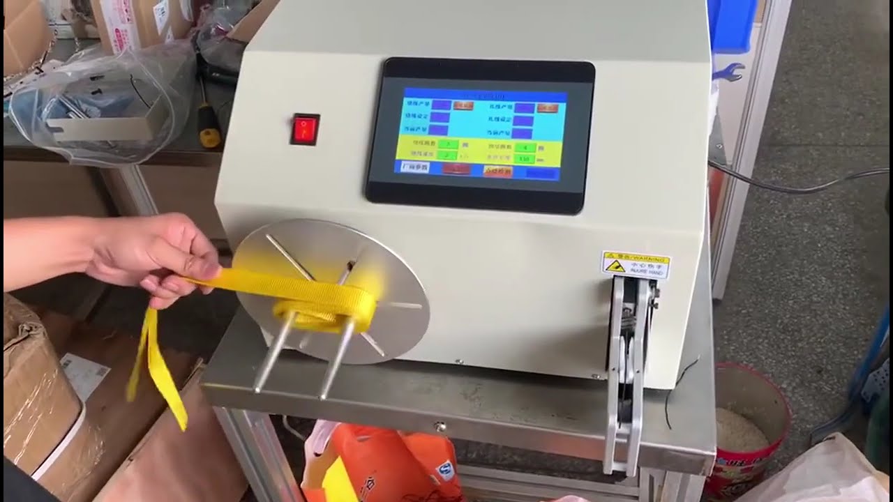 Winding and Tying Machine for Braided Wide Belts - Industrial Automation Display